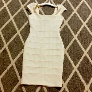 Beautiful mini dress with open zipper in the back.